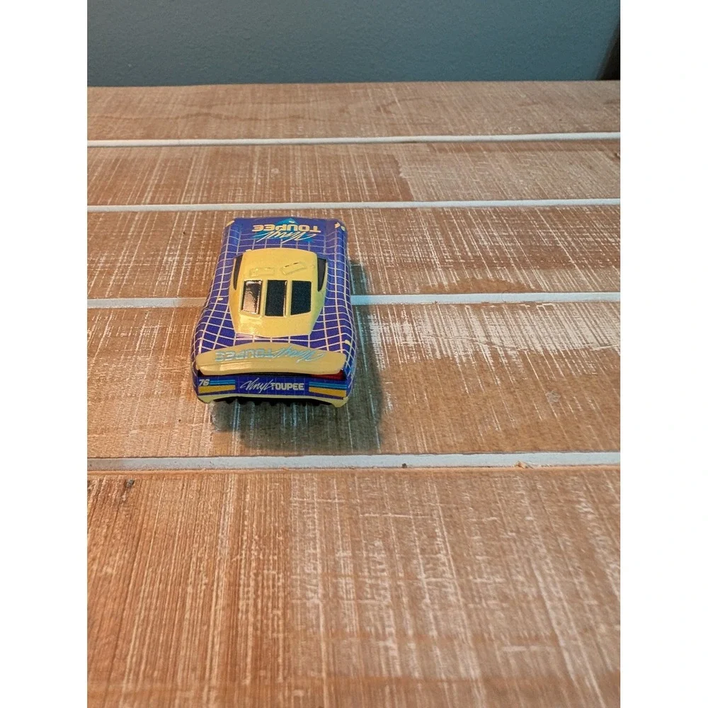 Disney Pixar Cars Vinyl Toupee #76 Next-Gen Diecast Mattel FGD71 Purple Yellow